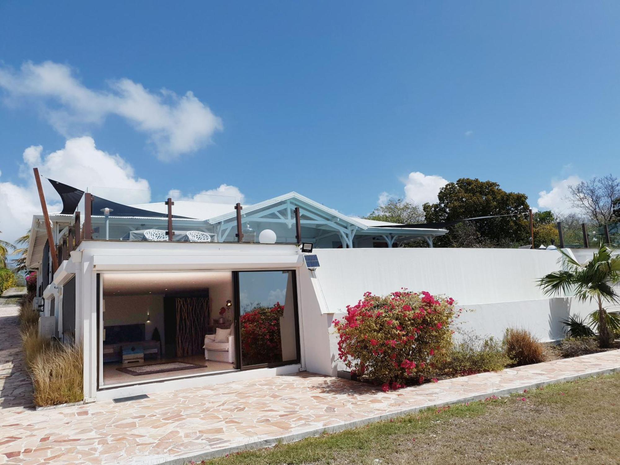 Villa Deluxe L'Hacienda Villa Vue Mer 180 Piscine Jacuzzi Proche Plage Marina Golf Pointe Des Chateaux Et Casino Jardin Clos Voyage Durable Saint-Francois  Rum bild