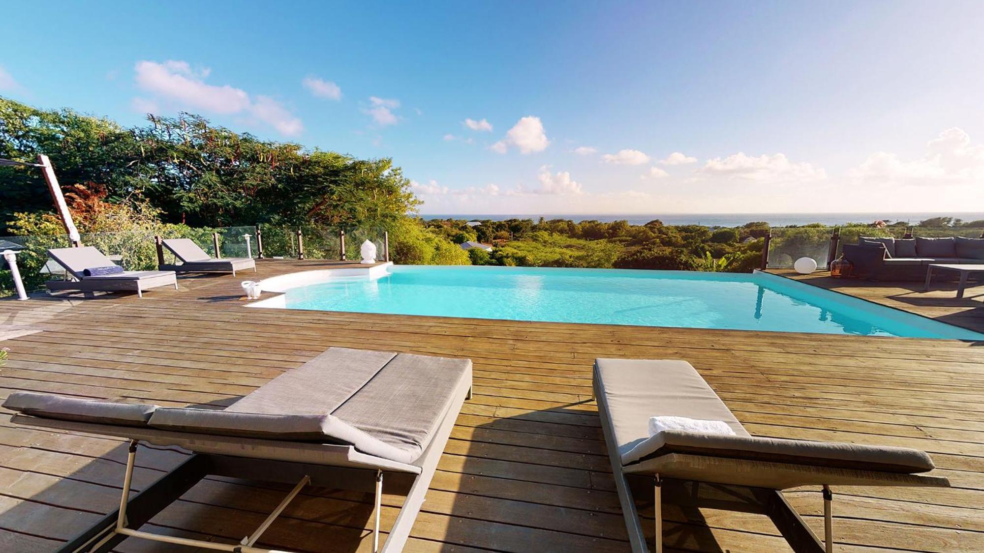 Villa Deluxe L'Hacienda Villa Vue Mer 180 Piscine Jacuzzi Proche Plage Marina Golf Pointe Des Chateaux Et Casino Jardin Clos Voyage Durable Saint-Francois  Rum bild